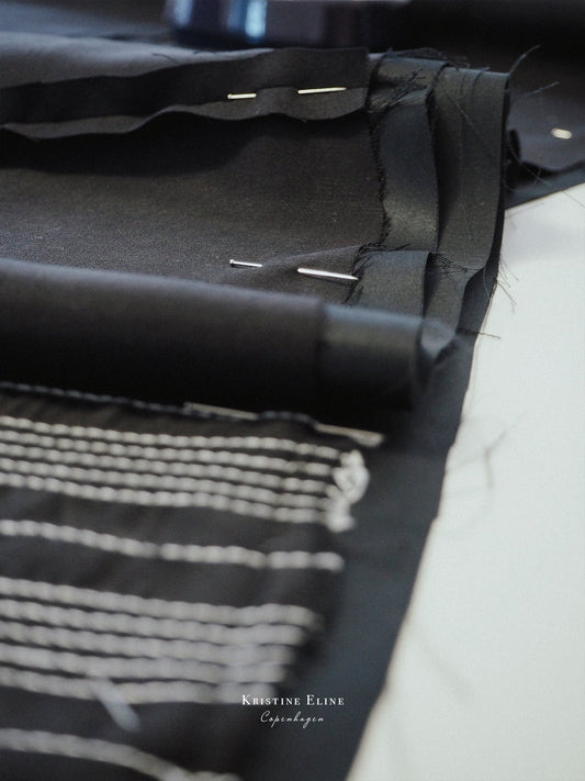 The Black Ruffle Top. Two Fabrics, one story